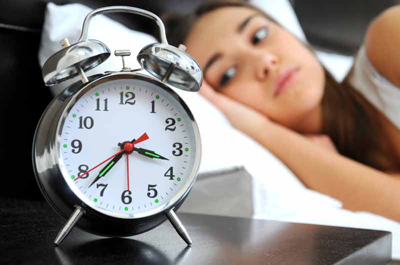 Woman suffering from insomania