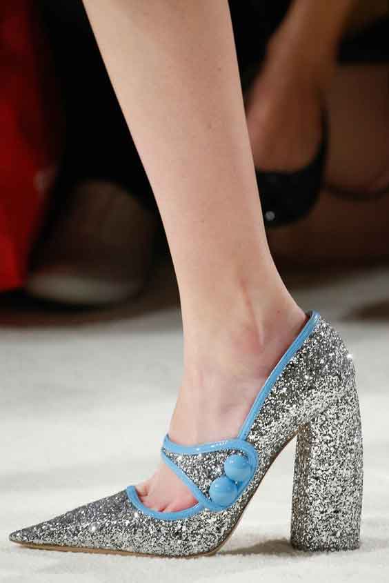 Shoes adorned with glitter, jewels, fluffy adornments