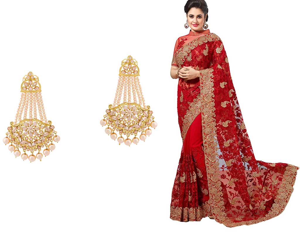 Red saree with pearl earrings