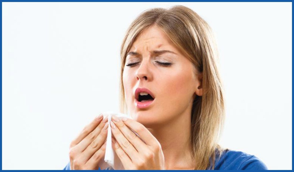 girl sneezing