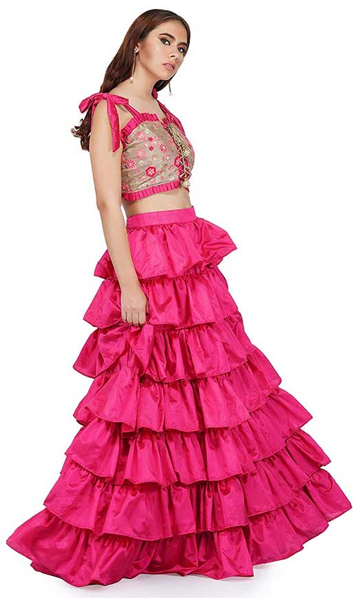 Pink silk embroidered ruffled crop-top and skirt lehenga.
