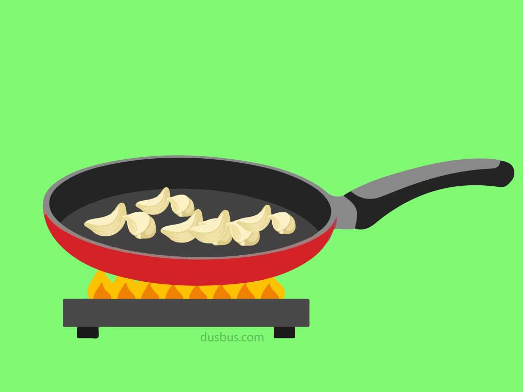 Frying Garlic On Pan