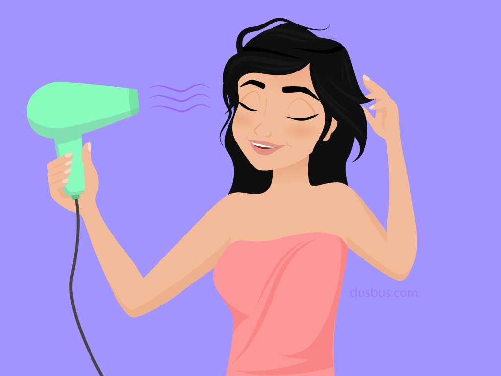 Girl blow-drying her hair