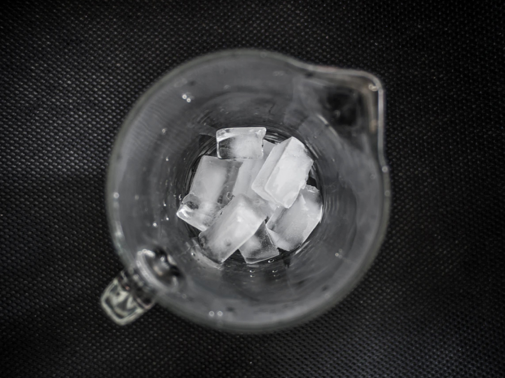 ice cubes kept in a glass mug