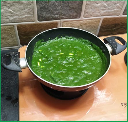 palak paneer cook frying pan