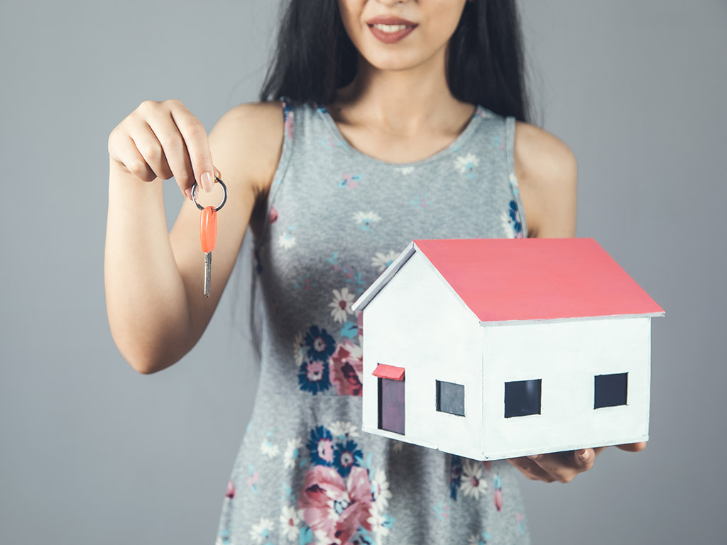 woman hold house key