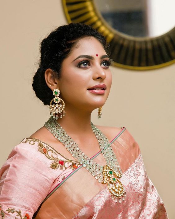 Floral Embroidered Pink Saree with Matching Jewellery
