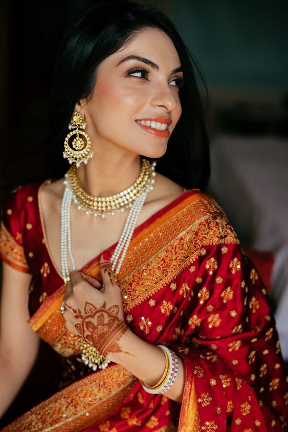 traditional saree with pearl necklace