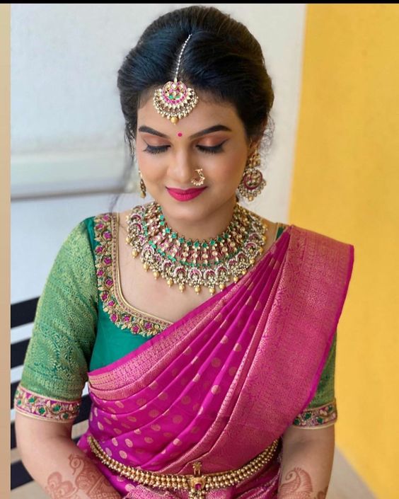 Pink Saree, Green Blouse & Matching Jewellery