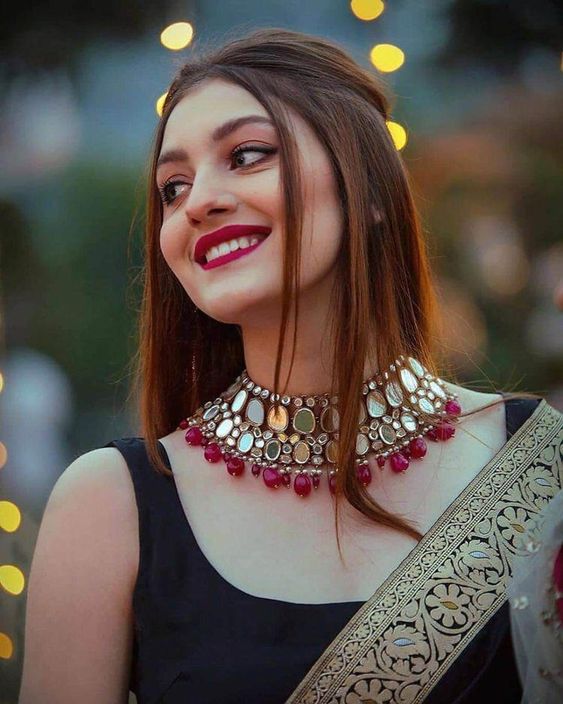 Stylish Choker Over a Black Saree