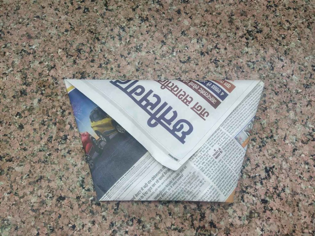 back portion of folded paper bag