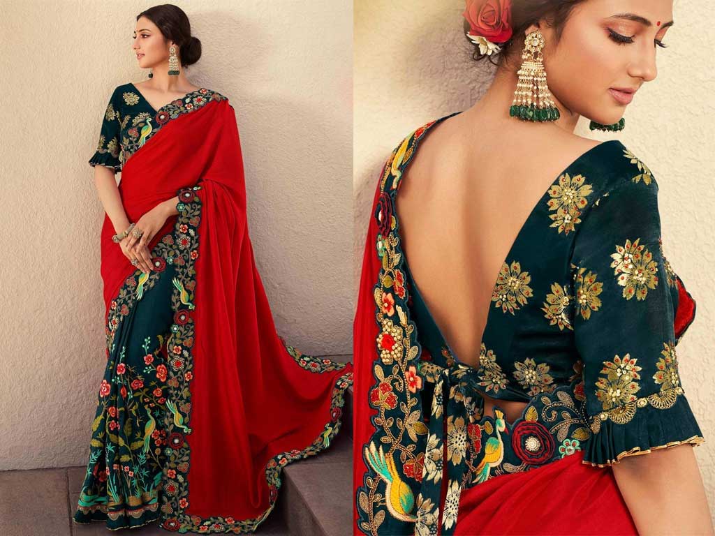 woman wearing embroidered saree and blouse