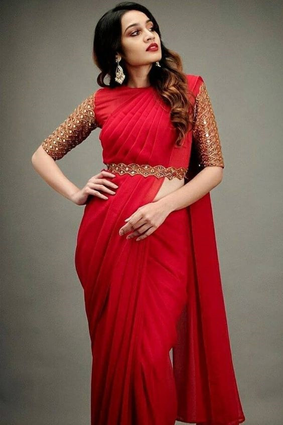 red saree with golden belt