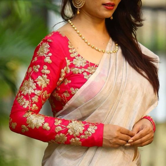 white saree and pink blouse