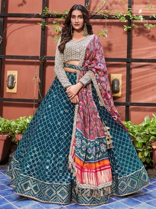 A Peacock Blue Shade Wedding Lehenga With Contrast Odhani