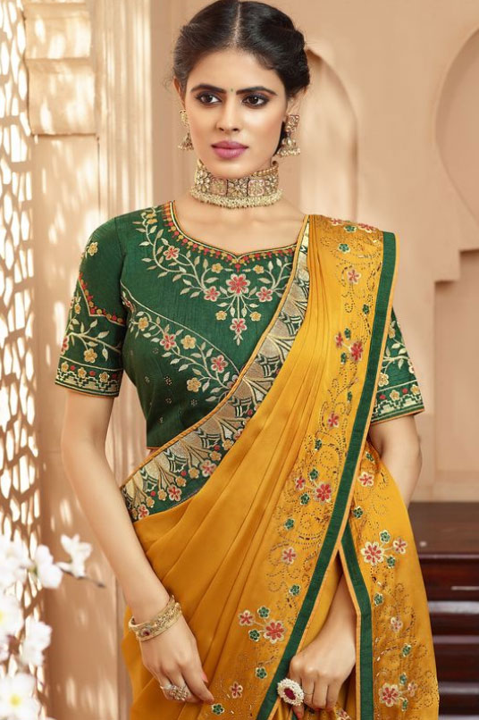 Yellow Saree And Green Blouse