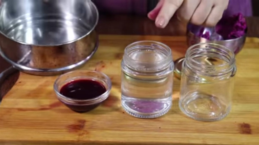 collecting rose water in glass jar or bottle