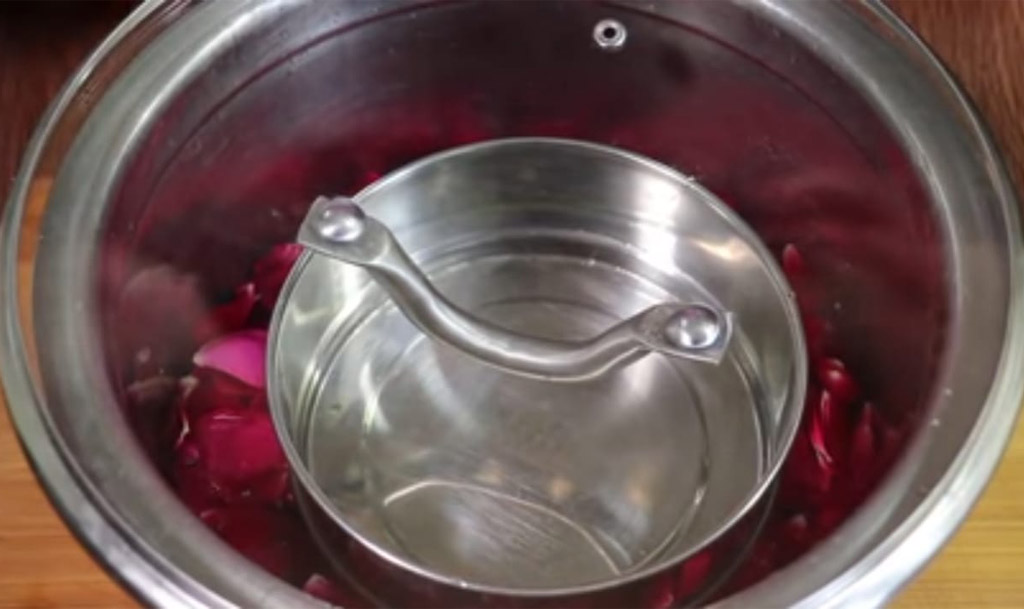 rose petal in utensil covered with lid