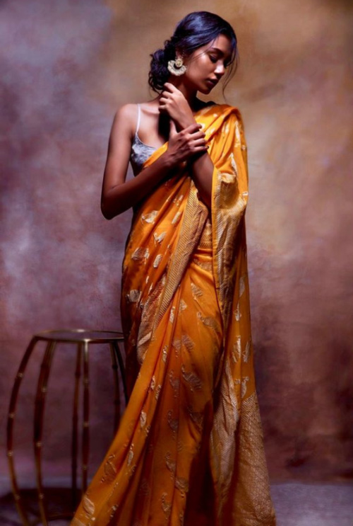 Yellow And Gold Tone Leaves Pattern Saree