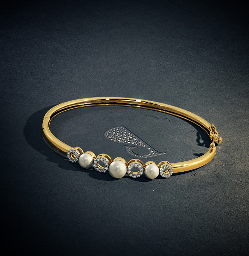 Stylish Gold Pearl Studded Bangles