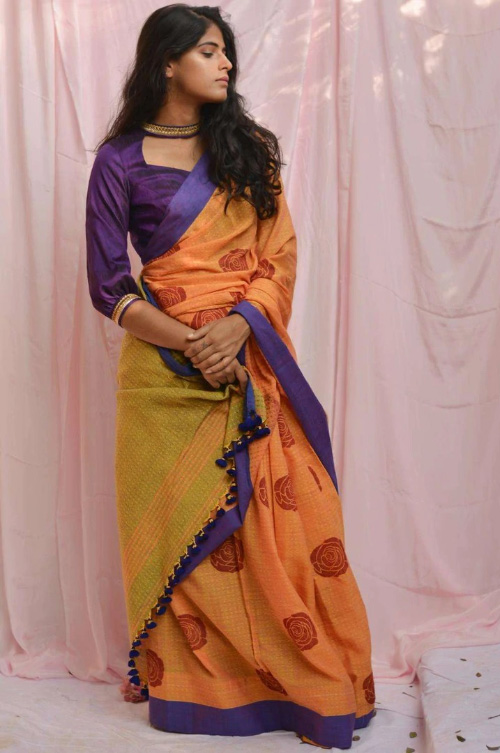 Orange Saree With Violet Blouse