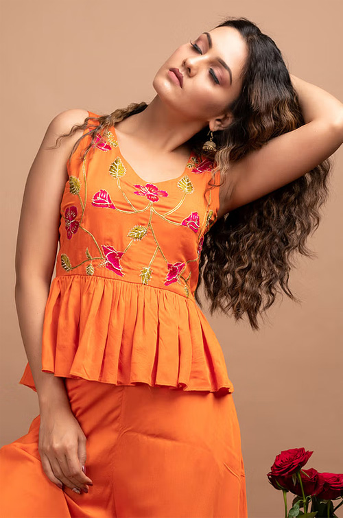 Orange Embroidered Peplum Blouse
