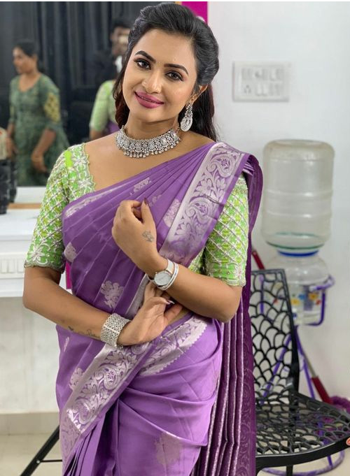 Purple Saree And Green Blouse