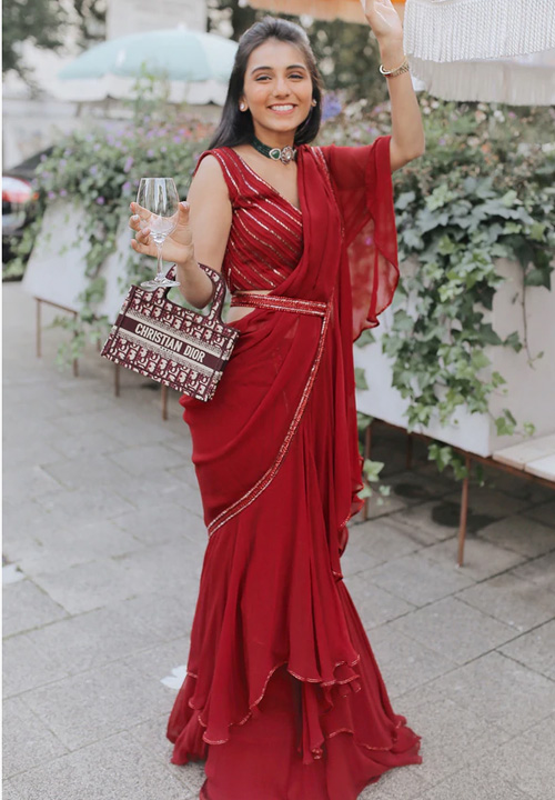 Red Saree And Handbag