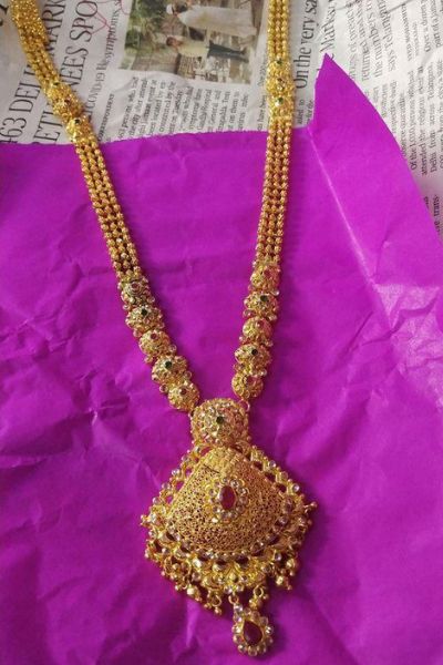 15. Ruby Stud Gold Necklace Design
